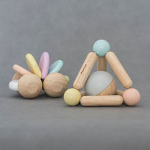 Load image into Gallery viewer, PlanToys Clutching Toy: Triangle (Pastel)